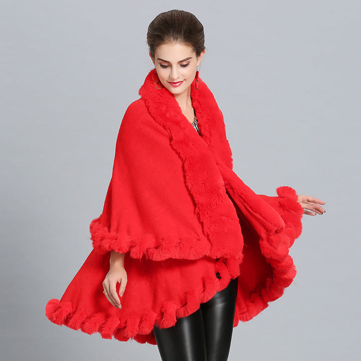 Ladies hooded poncho with luxurious fur collar and elegant trim Lune London