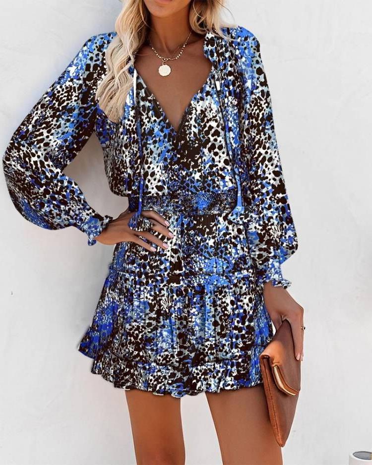 Ladies mini playful dress with colorful pattern and flounced details Lune London