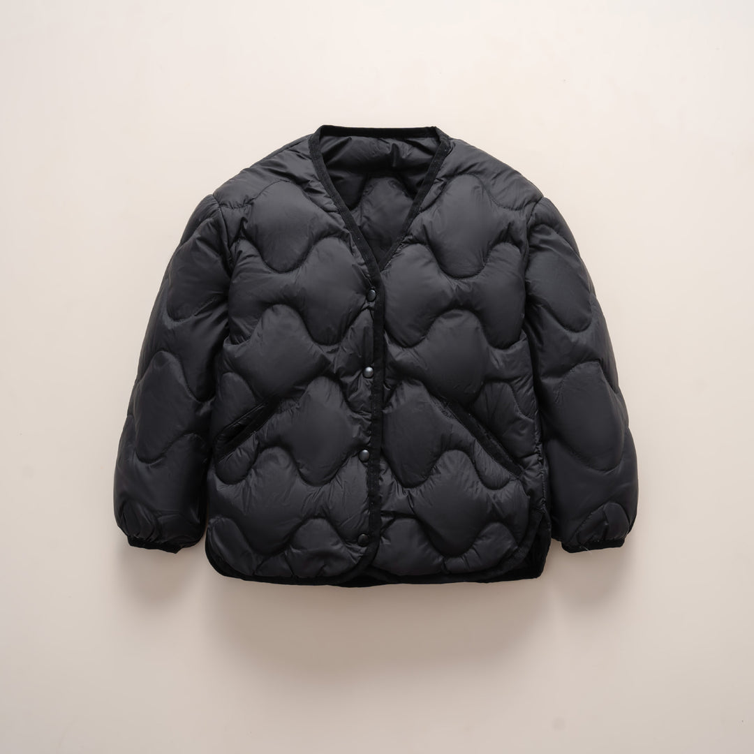 Quilted down jacket for women with modern wave patterns and practical pockets Lune London