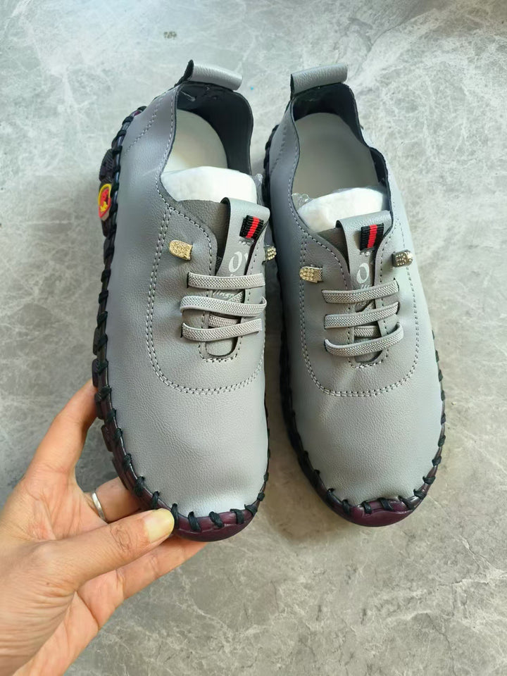 Women's lightweight, soft slip-on with hand-stitched rubber sole and elastic lacing Amarae