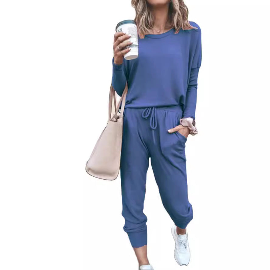 Women's Comfortable Jumpsuit with Stylish Round Neckline and Adjustable Waistband Lune London