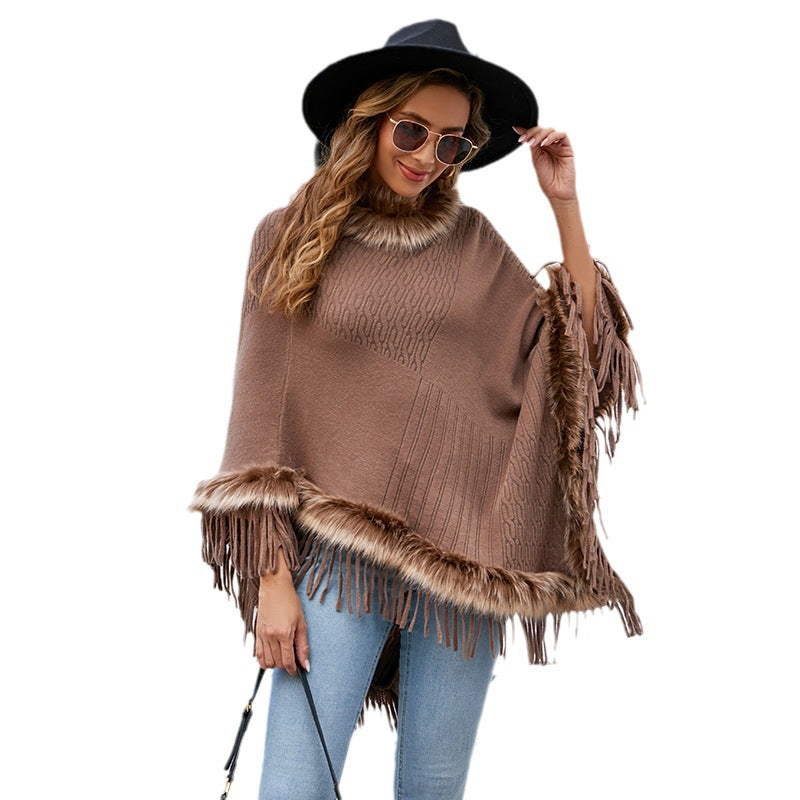 Ladies elegant poncho with luxurious faux fur collar and decadent fringes Lune London