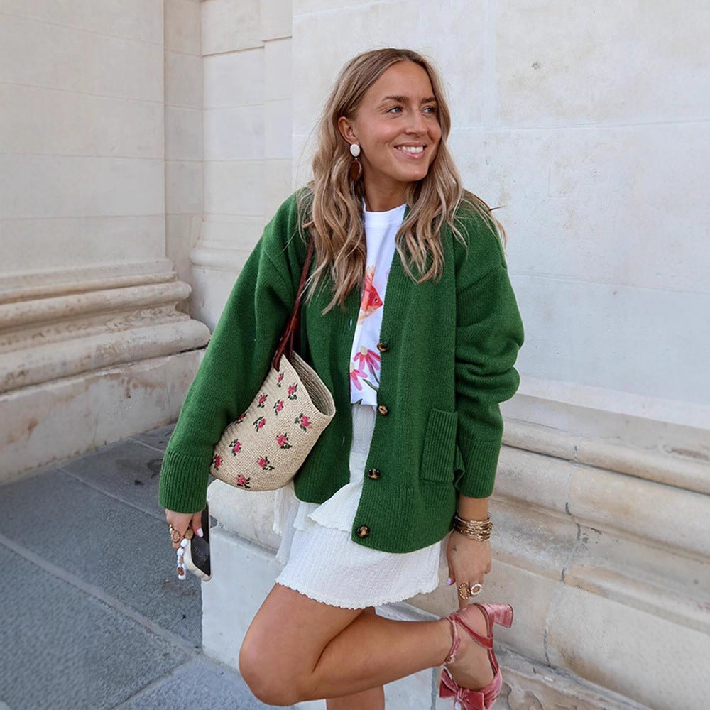 Women's oversized knit cardigan with decorative button placket, patch pockets, and elongated cuffs Amarae