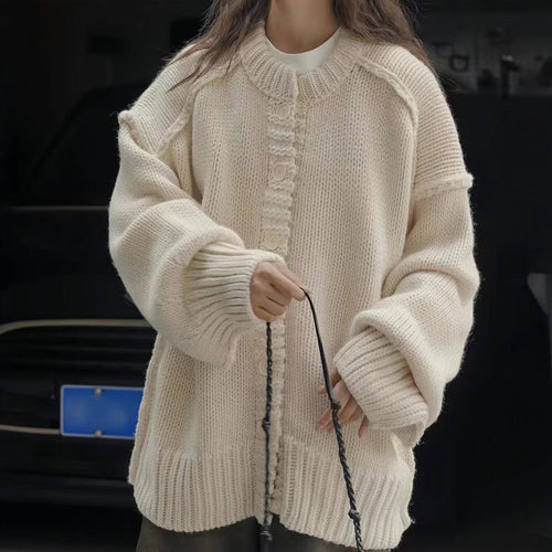 Oversized knitted jacket for women with special button details and wide sleeves Amarae