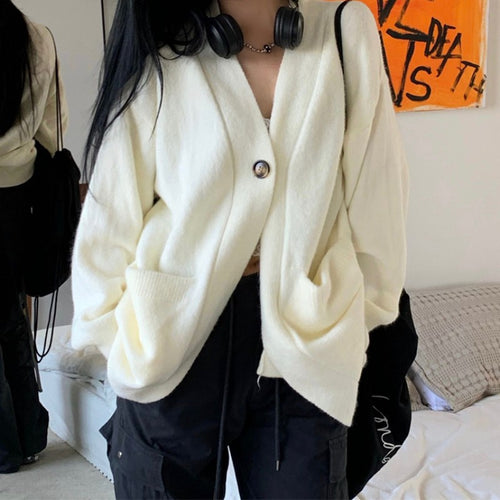 Cardigan femme confortable avec grandes poches et fermeture à boutons continue Chic & Stil