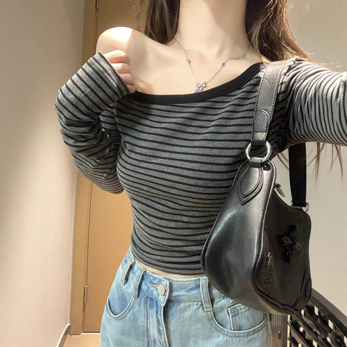 Women's asymmetrical long sleeve shirt with a light stripe pattern Chic & Stil