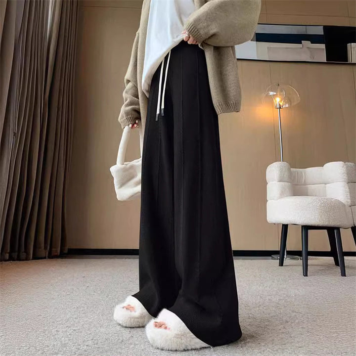 Pantalon de loisirs femme à coupe large avec taille élastique et poches pratiques Chic & Stil