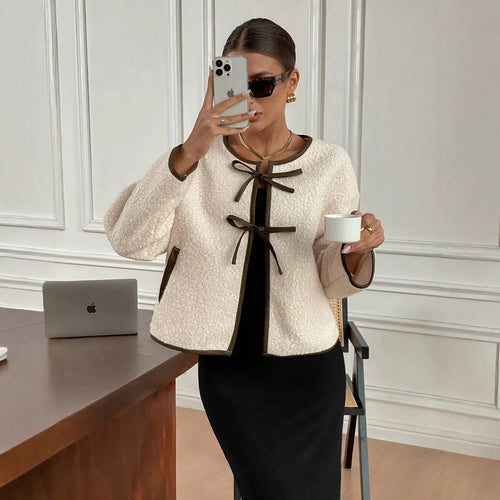 Comfortable fleece jacket for women with decorative laces and practical pockets Amarae