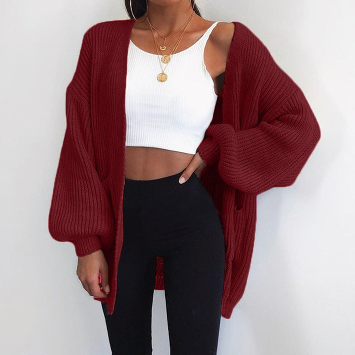 Thick knitted cardigan for women with relaxed oversized sleeves and large pockets Lune London