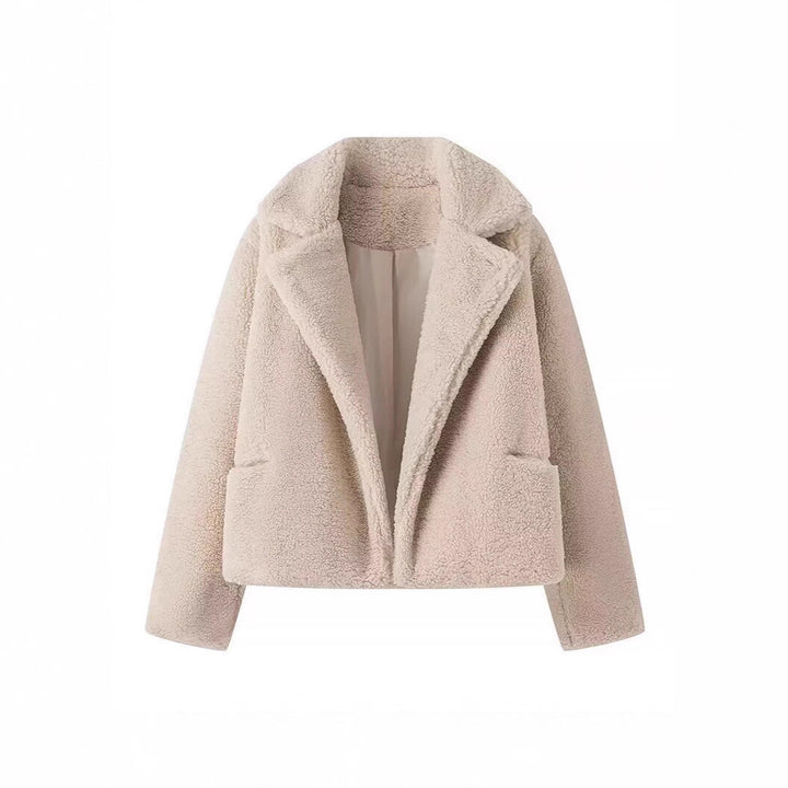 Veste en polaire confortable pour femmes avec des revers élégants et des poches pratiques Chic & Stil