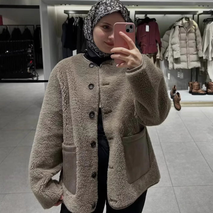 Ladies comfortable teddy jacket with practical pockets and button closure Lune London