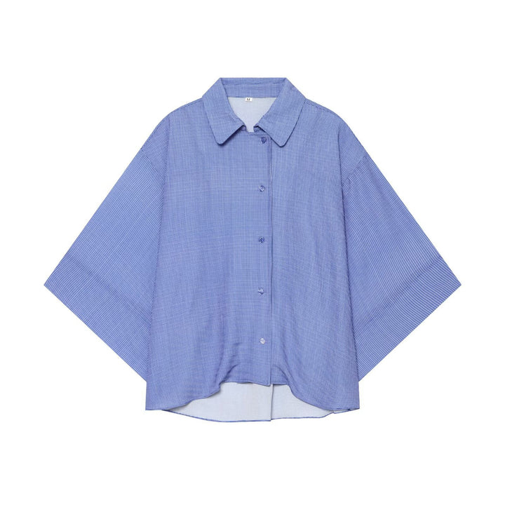 Women's oversized shirt blouse with waffle texture, boxy silhouette, and high-low hem