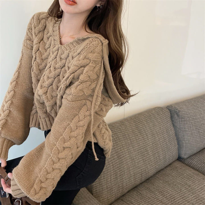 Poncho en tricot épais pour femmes avec capuche et design contemporain Chic & Stil