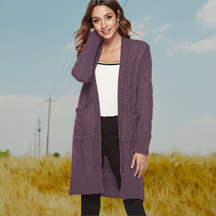Women's knitted coat with voluminous sleeves and practical pockets Lune London