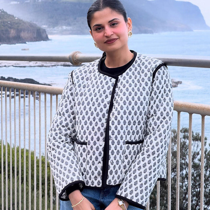 Women's Short Boxy Quilted Jacket with Contrast Piping and Round Neckline Amarae