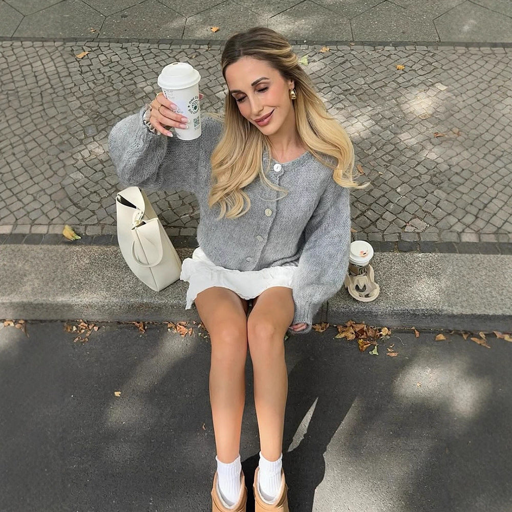 Women's cropped chunky knit cardigan with oversized balloon sleeves and visible button placket Amarae