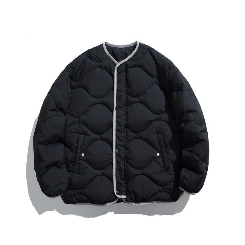 Unisex Kastig padded short jacket with circular quilting, round neckline and contrast piping Amarae