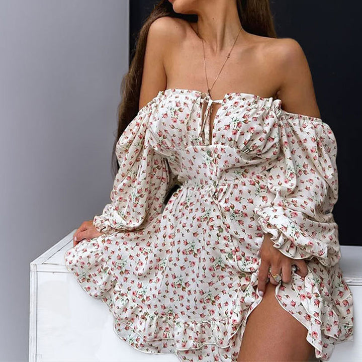 Robe femme décolletée avec motifs floraux et détails froncés Chic & Stil