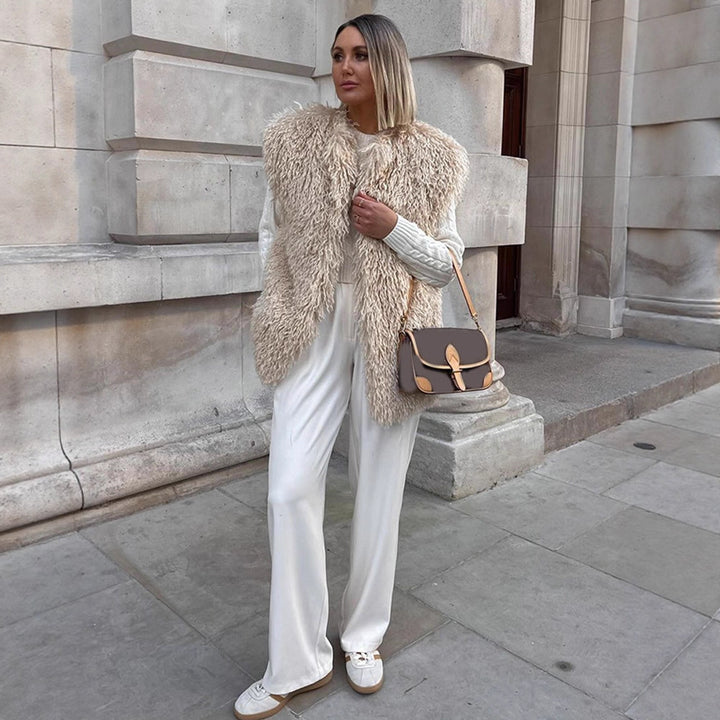 Women's Longer Cozy Faux Fur Vest with Shaggy Look and Front Pockets Amarae