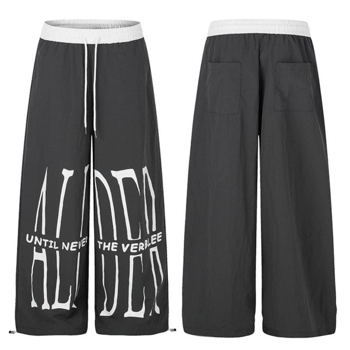 Women's wide loungewear pants with high comfort waistband, drawstring, adjustable hem, and typographic print Amarae