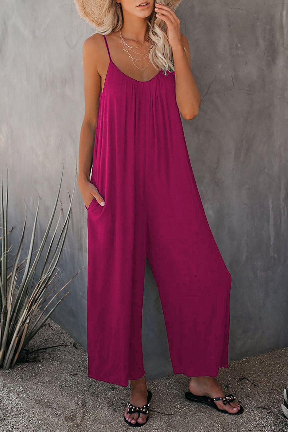 Casual summer jumpsuit for women with plunging neckline and practical pockets Lune London