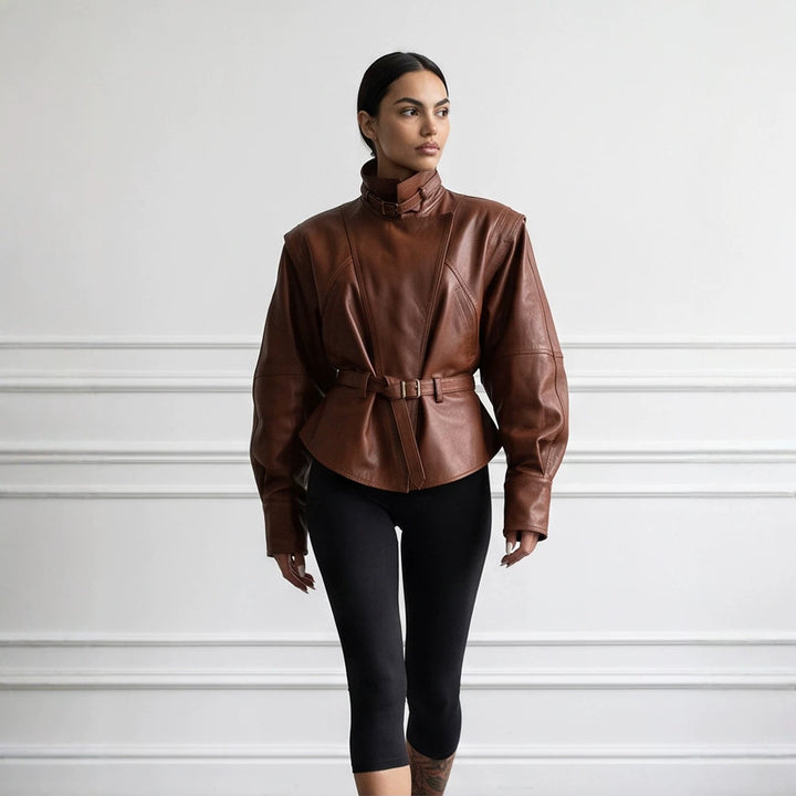 Women's tailored faux leather jacket with standing collar, neck strap, and figure-shaping waist belt Amarae