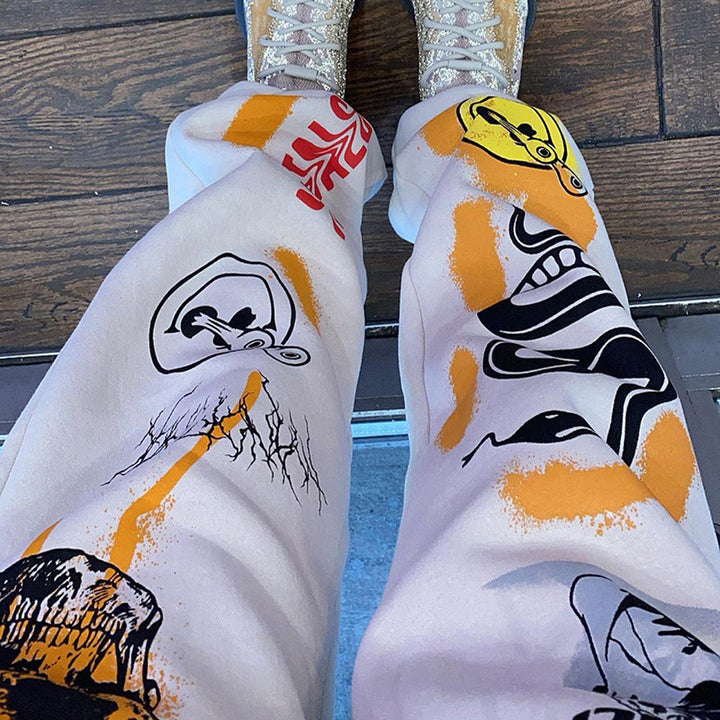 Women's graphic joggers with a high waistband, drawstring, and streetwear prints Amarae