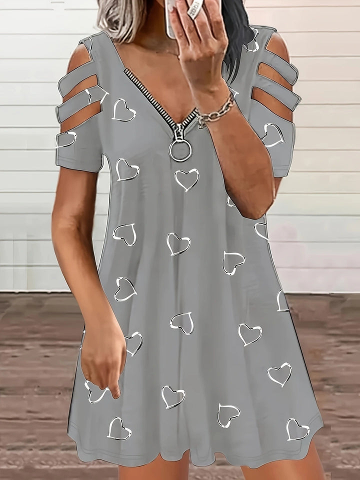 Leisure dress for women with cutout sleeves and a heart-shaped pattern Lune London