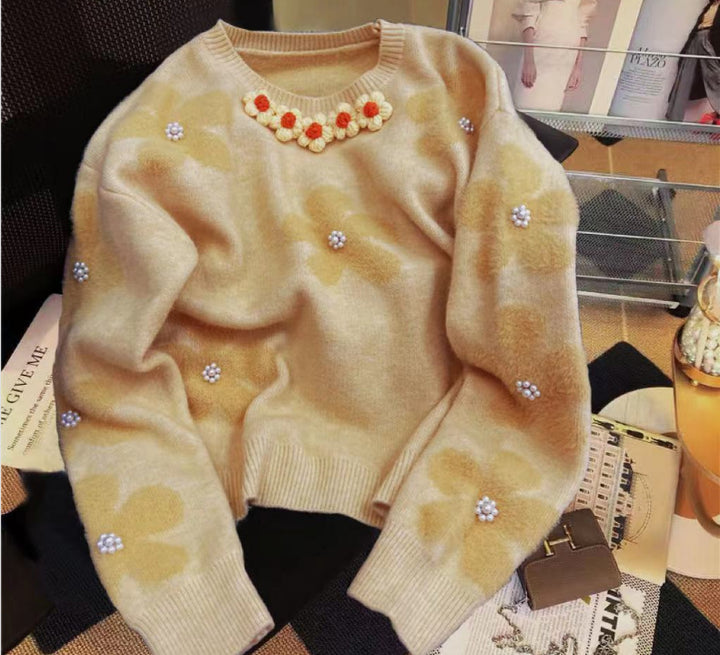 Pull en tricot pour femmes avec design floral et embellissements en perles Chic & Stil