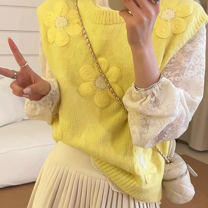 Pull en maille pour femme avec des appliqués floraux et une surface texturée Chic & Stil