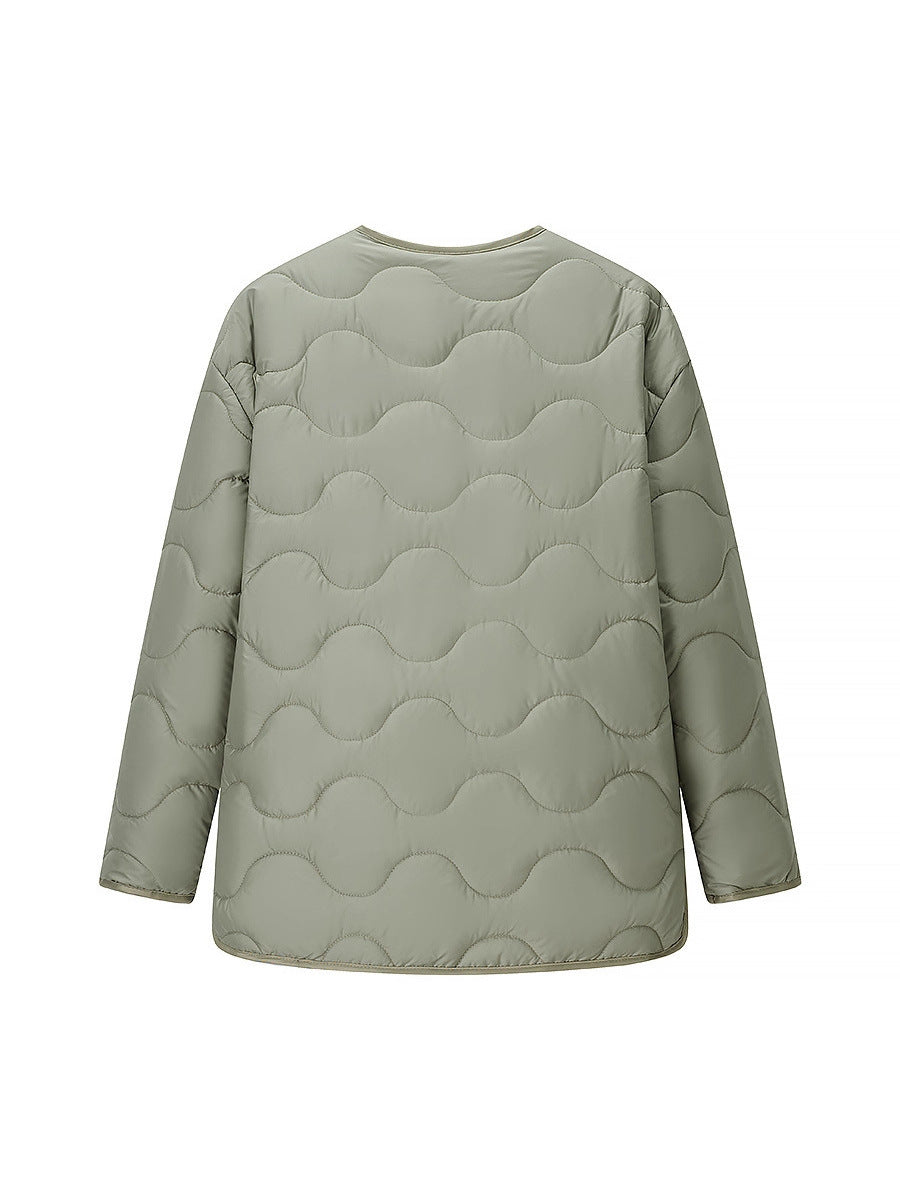 Quilted transition jacket for women with a soft fabric texture and practical snap buttons Lune London