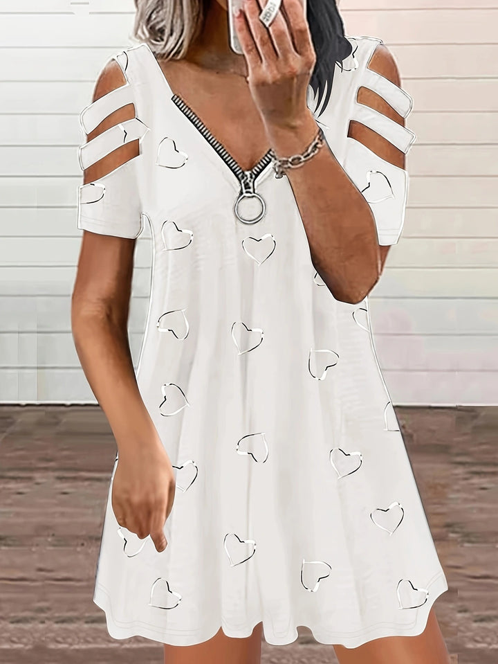 Leisure dress for women with cutout sleeves and a heart-shaped pattern Lune London