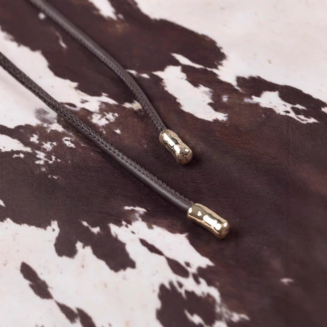 Women's loosely cut shirt blouse with cow spot print and concealed button placket Amarae