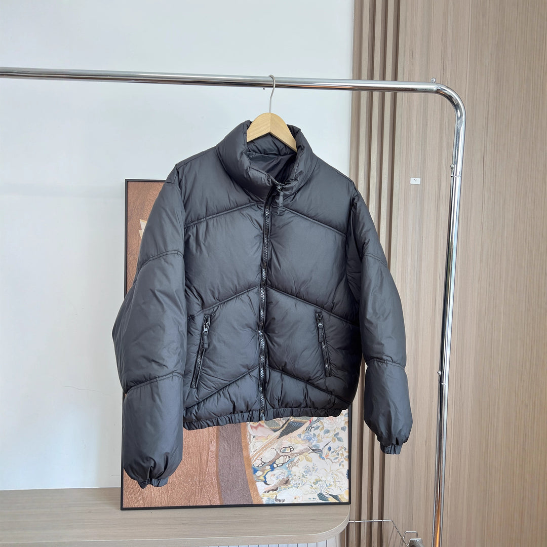 Men's short padded quilted jacket in boxy cut with high stand-up collar and zip pockets Amarae
