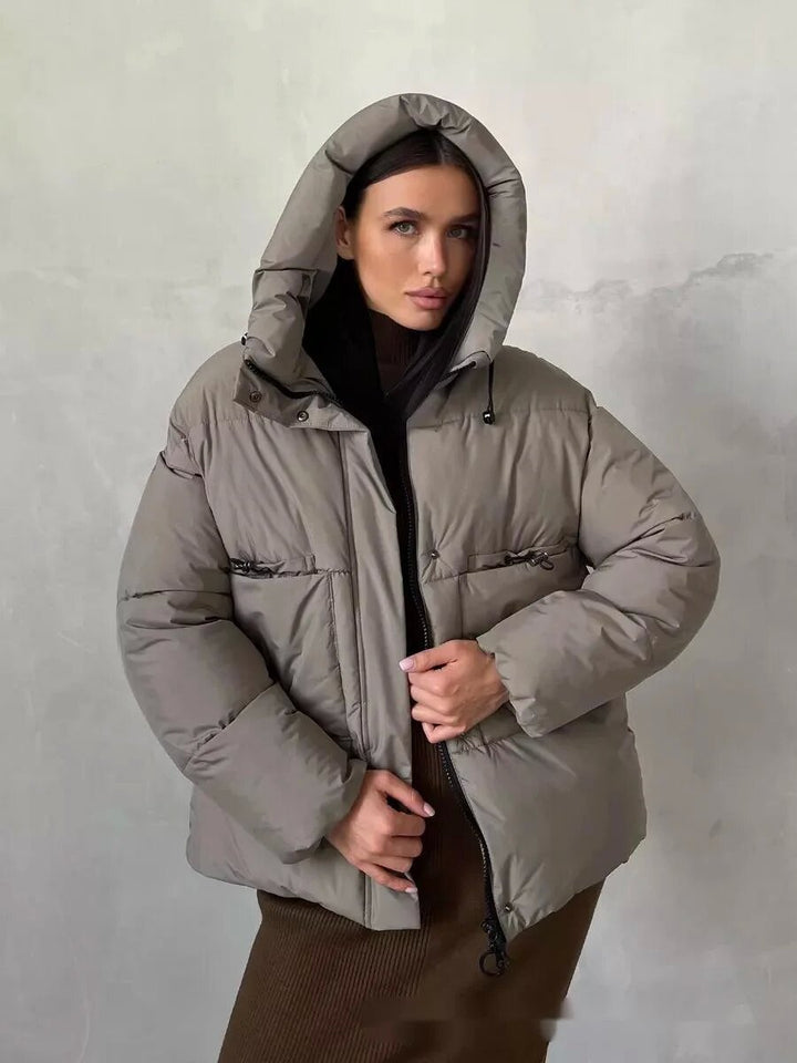 Sporty winter jacket for women with high collar and practical pockets Lune London