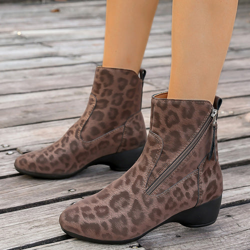 Elegant women's boots with animal print design and side zipper Amarae