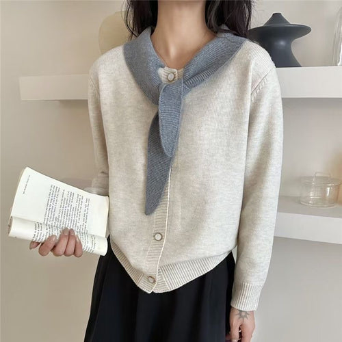Fashionable women's cardigan with decorative scarf and button details Amarae