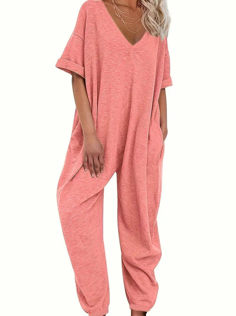 Oversized jumpsuit for women with deep V-neckline and casual pockets Lune London