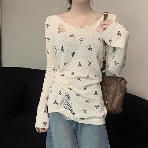 Women's long sleeve shirt with stylish rips and playful motif Amarae
