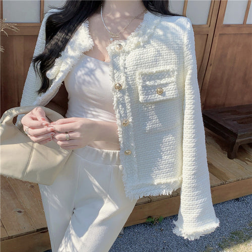 Veste courte élégante pour femmes avec des boutons décoratifs structurés Chic & Stil