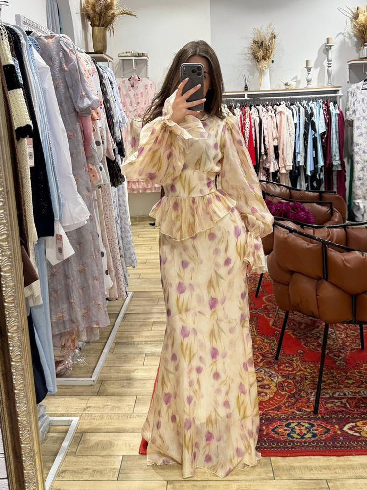 Women's dress made of transparent chiffon with fitted bodice, ruffled peplum and voluminous bell sleeves Amarae
