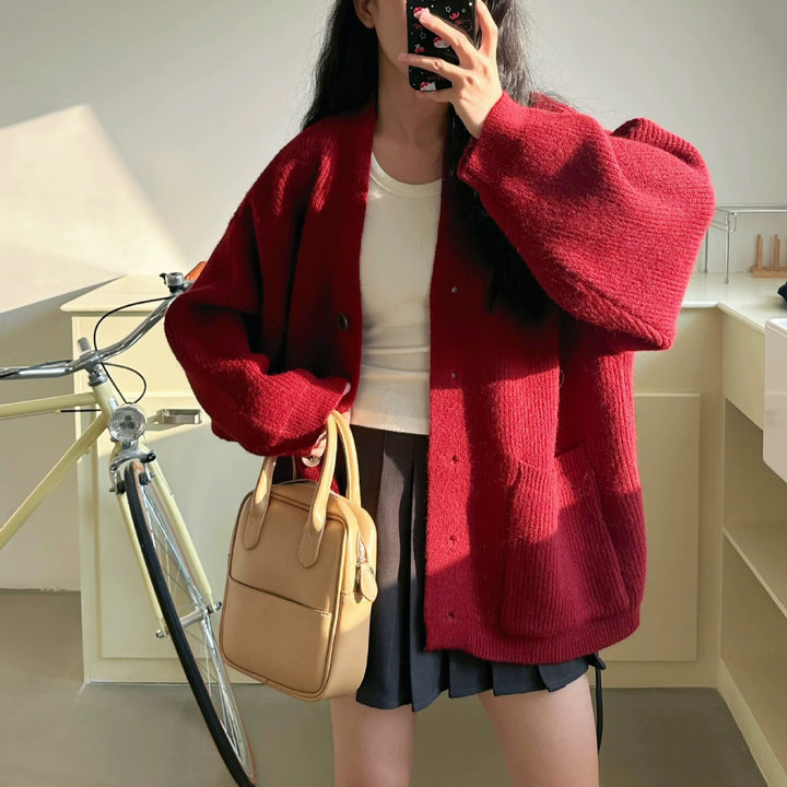 Cardigan en tricot épais pour femmes avec des détails de boutons élégants et des poches pratiques Chic & Stil