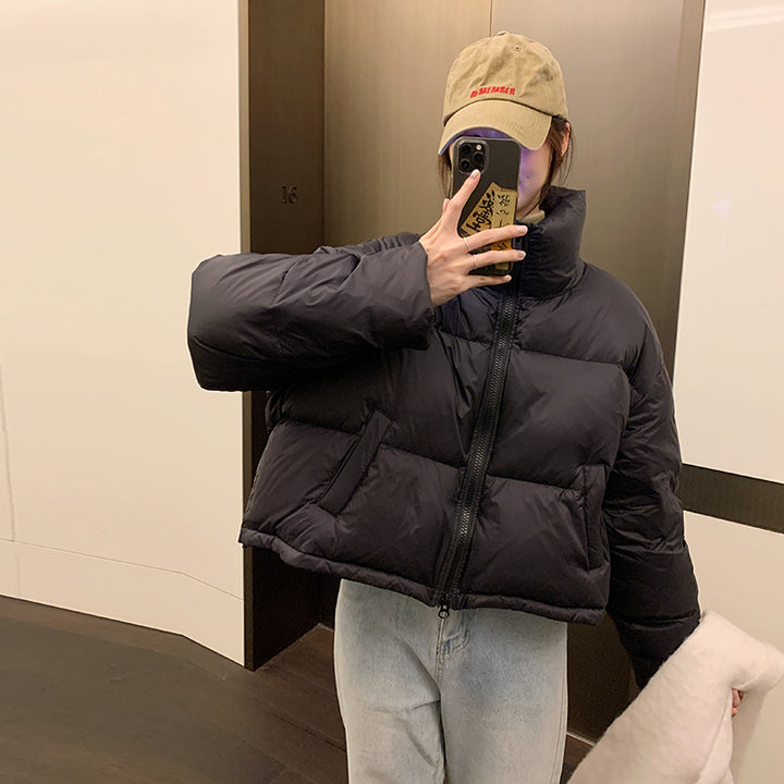 Short puffer jacket for women with high collar and side pockets Lune London