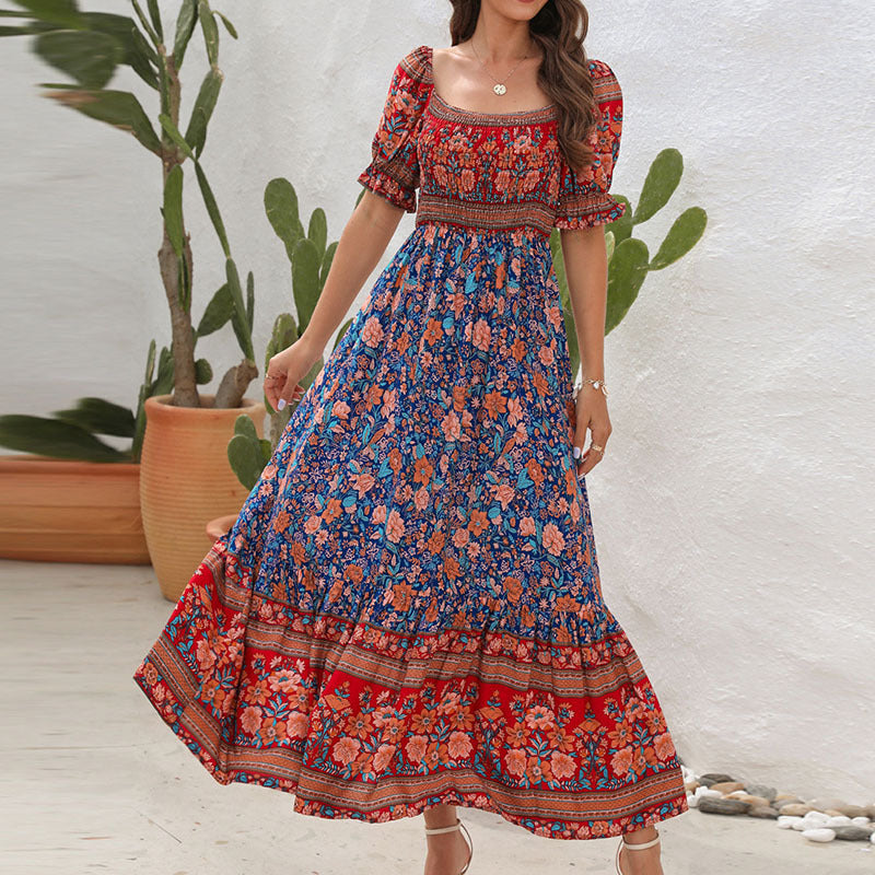Maxi dress for women with voluminous puff sleeves and a floral pattern Lune London