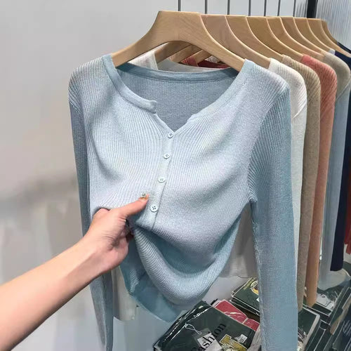 Fitted knit jacket for women with a stylish button closure and a fine ribbed structure Amarae
