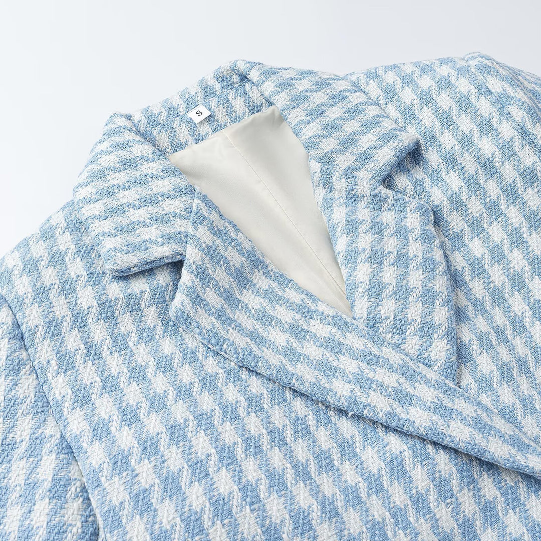 Ladies two-piece short blazer and pleated skirt ensemble in houndstooth style Amarae