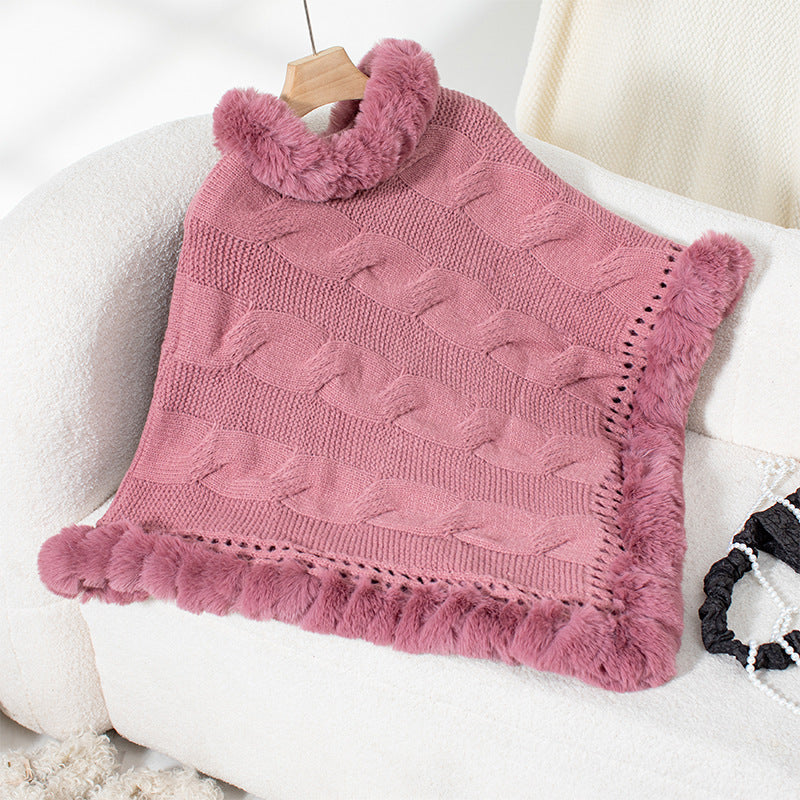Ladies cozy poncho sweater with soft faux fur trim and cable knit pattern Lune London