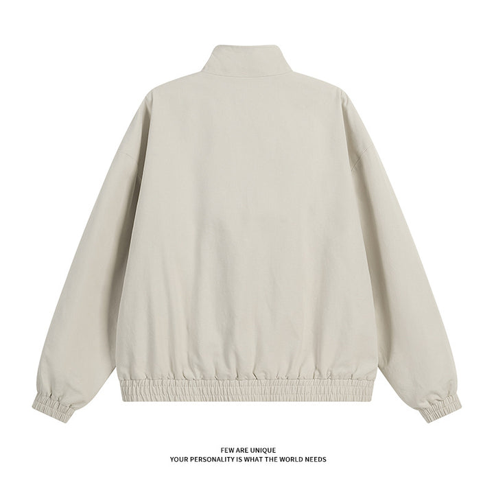 High-collared transition jacket for women with practical snap button details Lune London