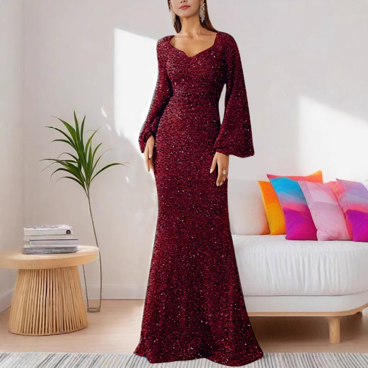 Ladies Glamorous Glitter Evening Dress with Swinging Skirt and Voluminous Sleeves Lune London