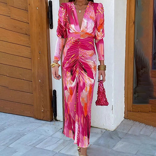Robe maxi pour femmes avec un élégant décolleté en V et des manches bouffantes luxueuses Chic & Stil